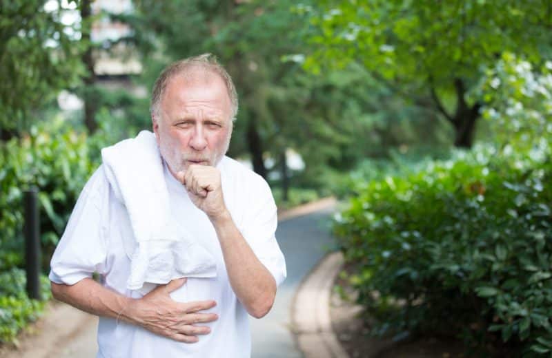Man coughing outside