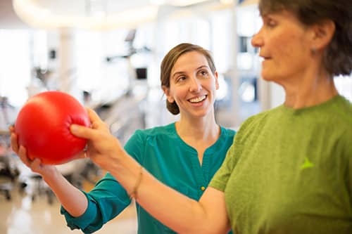 Physical Therapist Jillian MacDonald works with Barbara, a Parkinson's Disease patient at the Rehabilitation Institute of Chicago. | James Foster/For Chicago Health