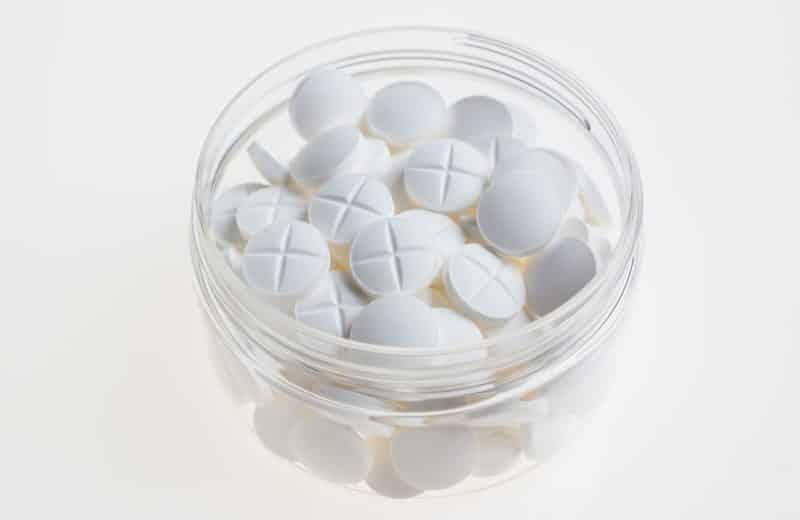 Stool softeners: small jar filled with white pills