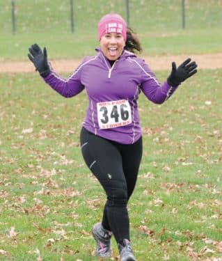 Evelyn Cato running. Photo courtesy of the Chicago Area Runners Association