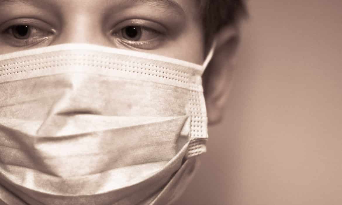 masked boy vaccine fear