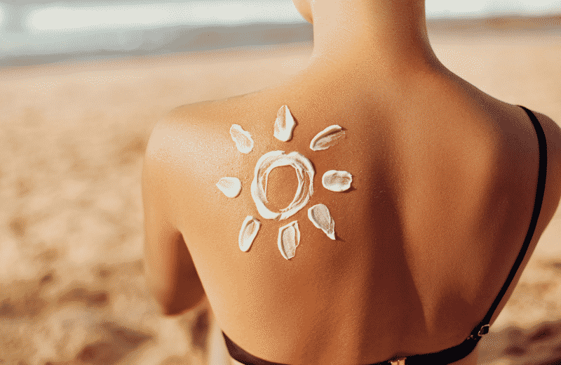 Woman with Sunscreen sun on back