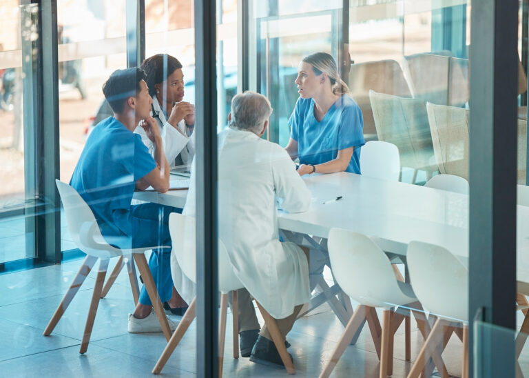 Physicians in meetine negotiating