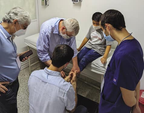 Peter Smith, MD, a pediatric orthopedic surgeon from Chicago, sees patients twice a year in Colombia.