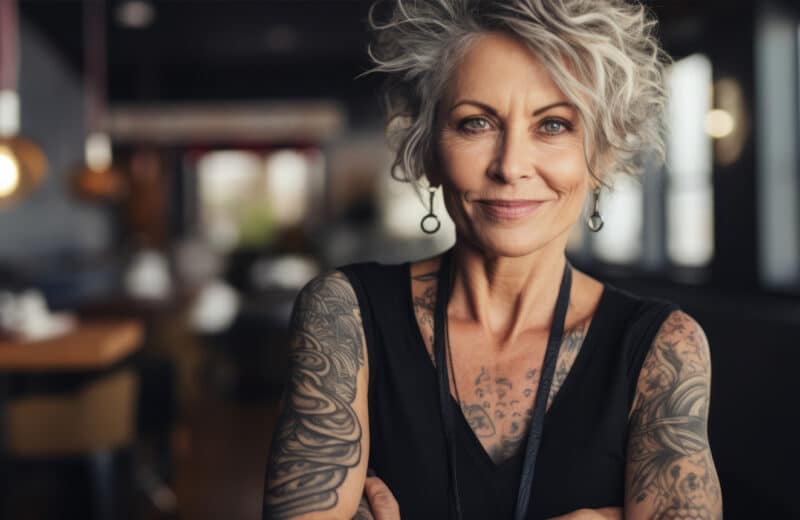 Portrait of a middle aged woman with tattoos