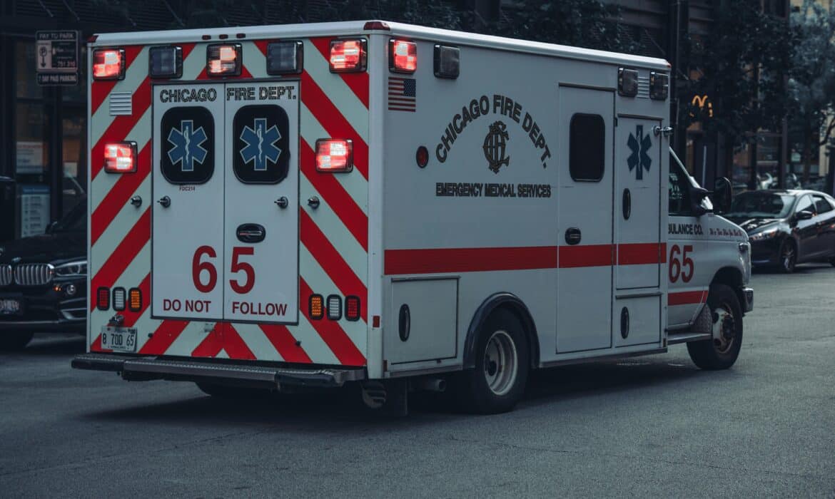 An ambulance drives down a street in Chicago.