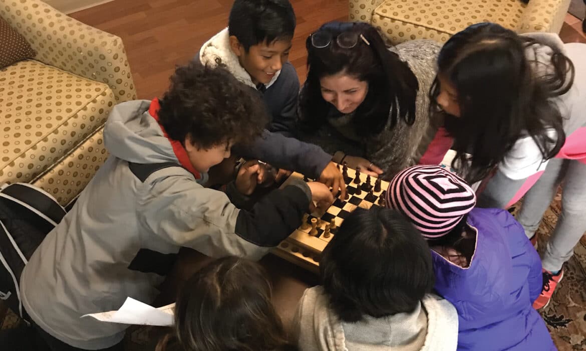 Children play chess at Youth Services of Glenview/Northbrook