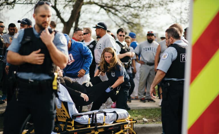 Emergency responders at a shooting, gun violence response. Photo by Jim Vondruska.