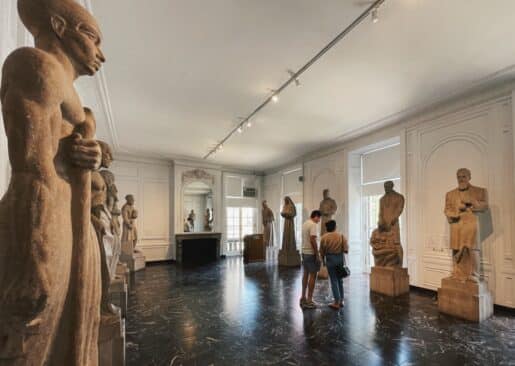 A hall filled with stone statues in Chicago's International Museum of Surgical Science