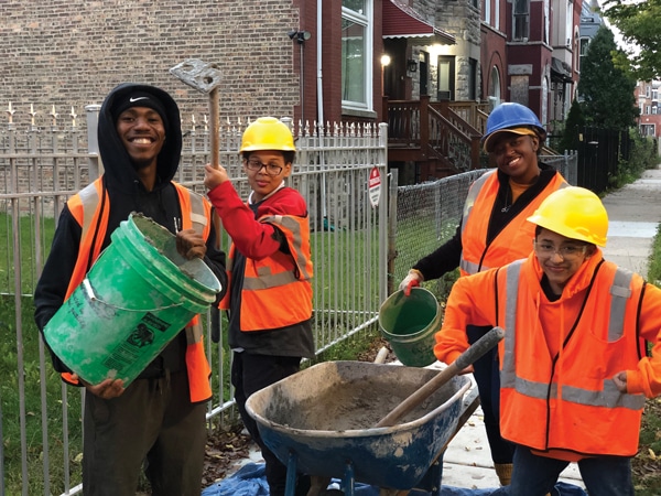 tuckpointing apprenticeships at R City’s Harambee Citybuilders program. Photos courtesy of R City