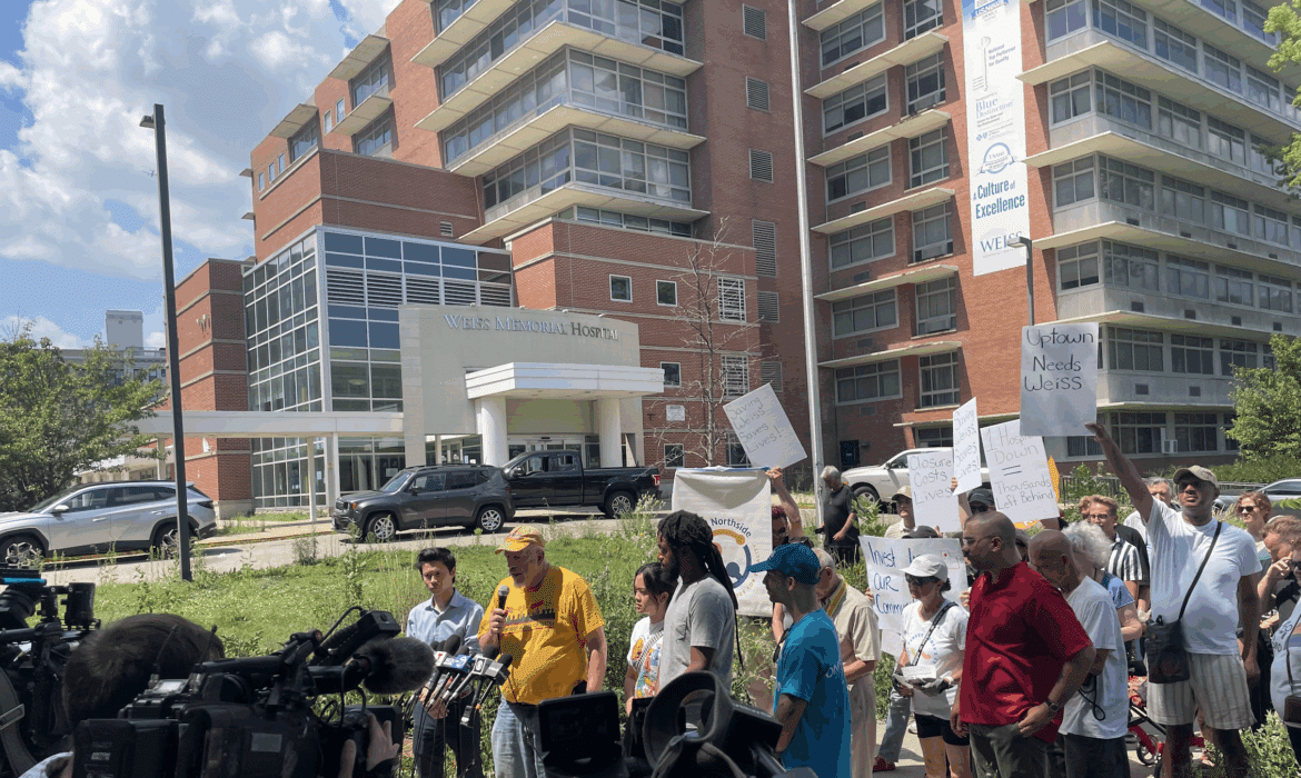 A group of protesters gather outside of Weiss Memorial Hospital on Aug. 8, 2025