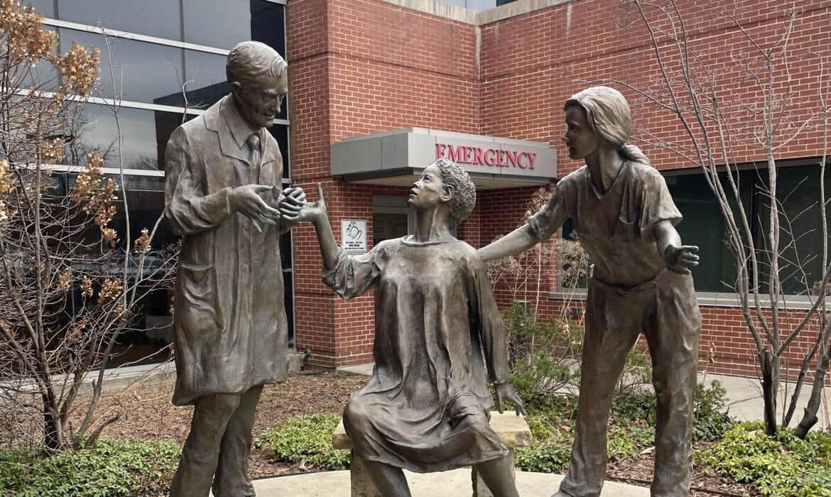 A bronze scuplture outside the emergency department at West Suburban Hospital.