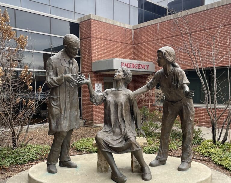 A bronze scuplture outside the emergency department at West Suburban Hospital.