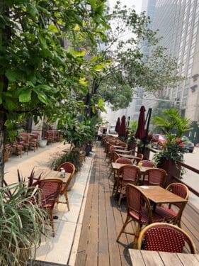 Empty tables at an outdoor restaurant